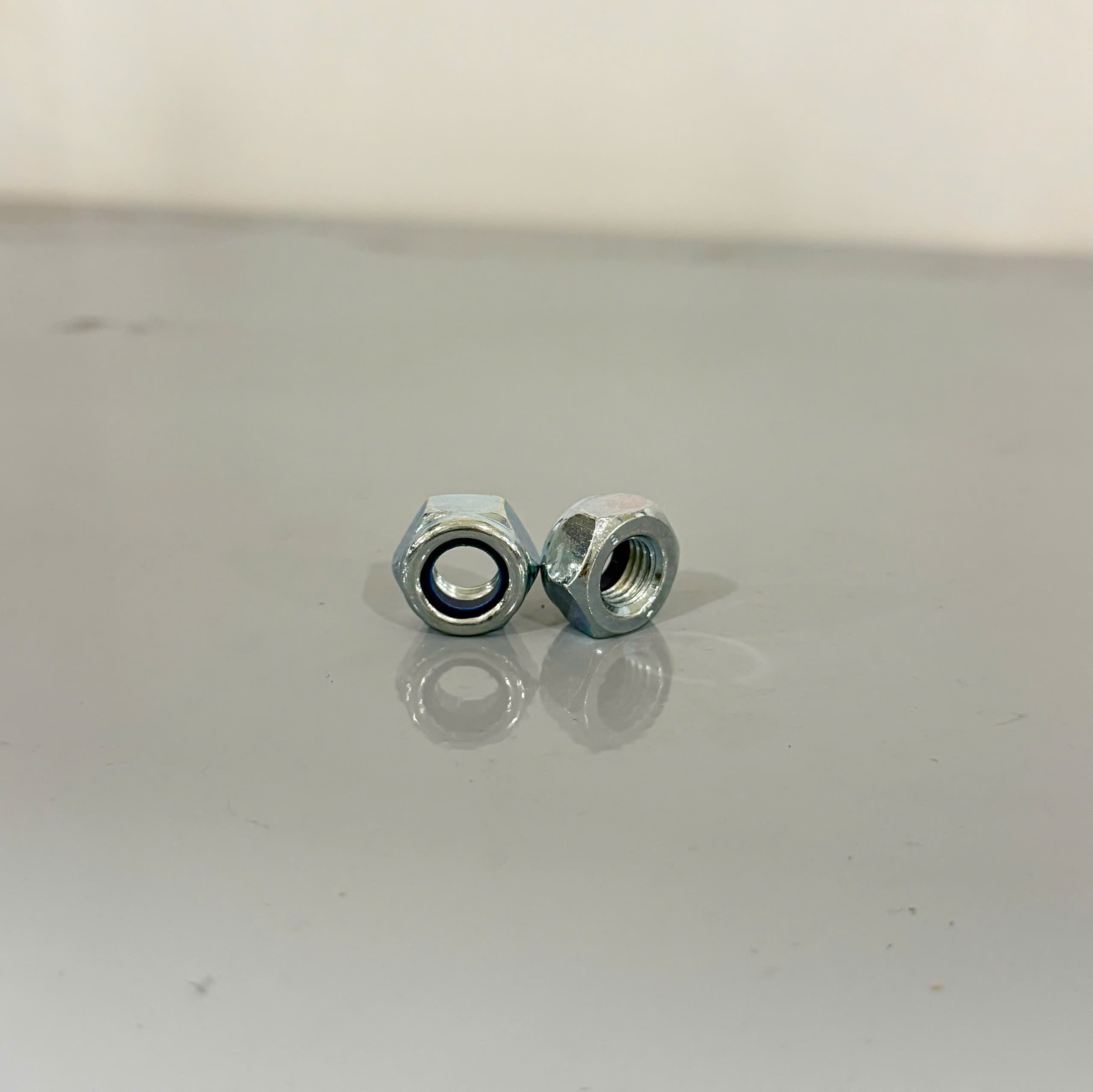 Tán Keo Thép Mạ Kẽm 8.8 DIN985 M10x1.25 Ren Nhuyễn
